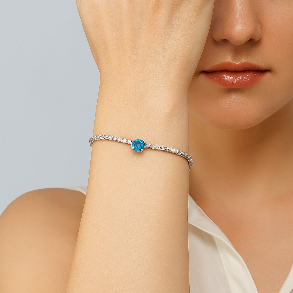 Elegant Silver Tennis Bracelet with Blue Crystal Centerpiece